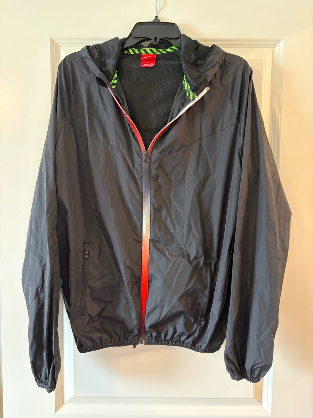Nike Black Hooded Windbreaker with Red Zipper Accent